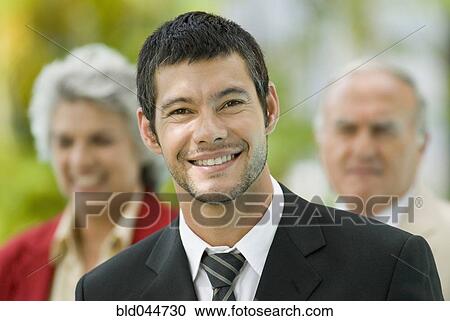 Stock Image - Portrait of Hispanic businessman. Fotosearch