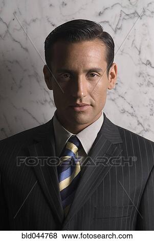 Stock Photo - Portrait of Hispanic businessman. Fotosearch