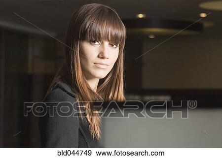 Stock Photo - Portrait of woman with long hair. Fotosearch