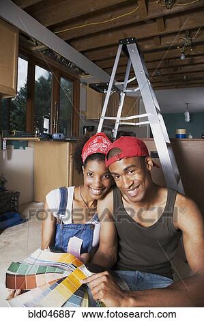 African American couple looking at paint swatches View Large Photo Image Stock Photo - African American couple looking at paint swatches. Fotosearch