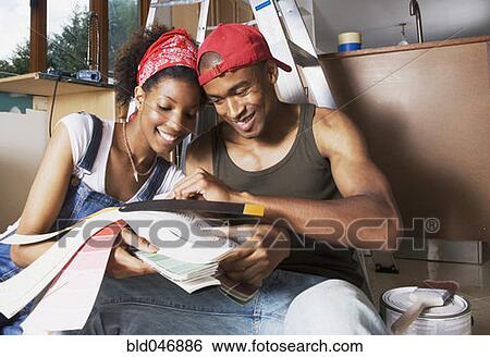 African American couple looking at paint swatches View Large Photo Image Stock Photograph - African American couple looking at paint swatches. Fotosearch