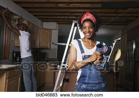 African American couple remodeling house View Large Photo Image Stock Image - African American couple remodeling house. Fotosearch