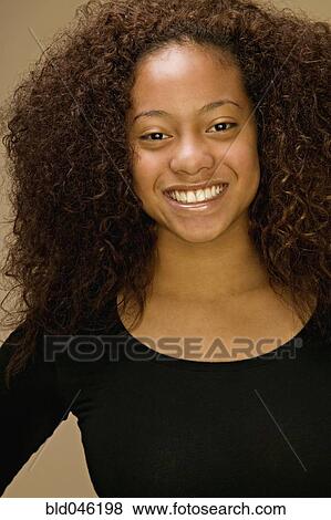 African American Girl With Curly Hair Stock Photo Bld046198