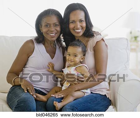 African American grandmother, mother and baby on sofa View Large Photo Image Stock Photography - African American grandmother, mother and baby on sofa. Fotosearch