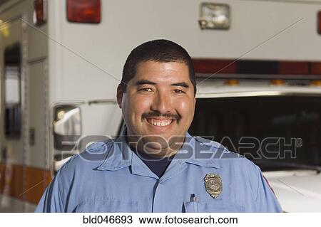Asian male paramedic in front of ambulance View Large Photo Image Stock Image - Asian male paramedic in front of ambulance. Fotosearch