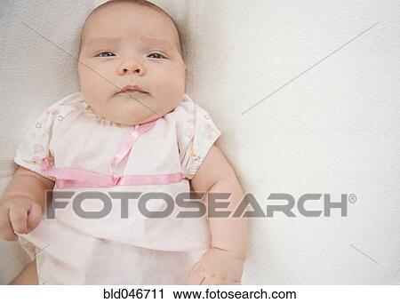 Stock Image - Close up of Hispanic baby. Fotosearch