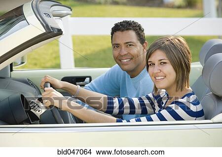 Hispanic father and daughter in car View Large Photo Image Picture - Hispanic father and daughter in car. Fotosearch
