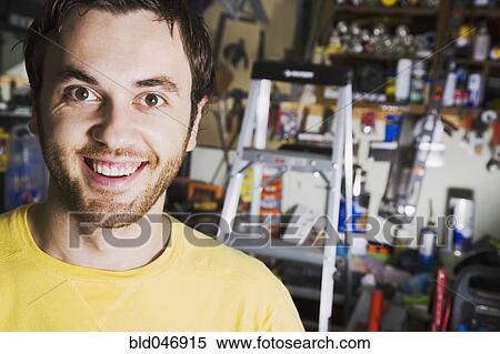 Middle Eastern man in home workshop View Large Photo Image Stock Photography - Middle Eastern man in home workshop. Fotosearch