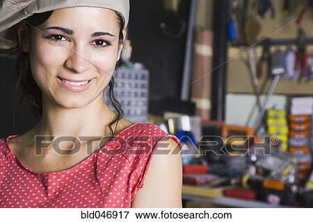 Middle Eastern woman in home workshop View Large Photo Image Stock Photo - Middle Eastern woman in home workshop. Fotosearch