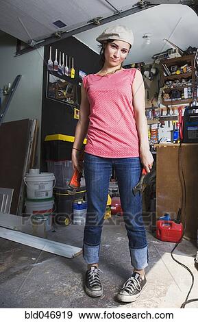 Middle Eastern woman in home workshop View Large Photo Image Stock Photo - Middle Eastern woman in home workshop. Fotosearch