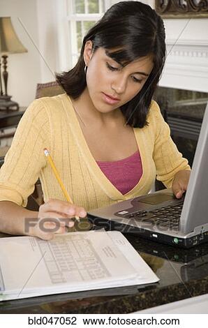 Mixed Race girl studying View Large Photo Image Stock Image - Mixed Race girl studying. Fotosearch