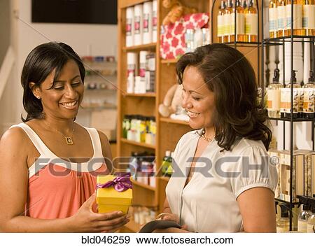 Multi-ethnic women shopping View Large Photo Image Stock Photo - Multi-ethnic women shopping. Fotosearch