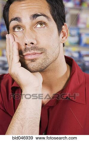 Pacific Islander man looking up View Large Photo Image Stock Photo - Pacific Islander man looking up. Fotosearch