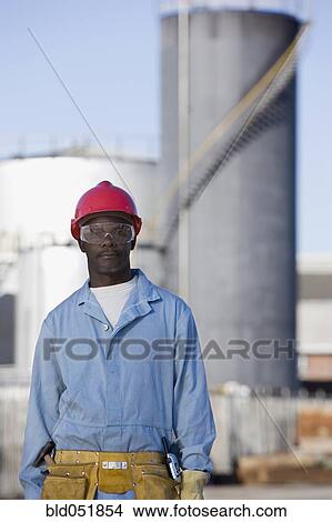 African American male construction worker wearing hardhat View Large Photo Image Picture - African American male construction worker wearing hardhat. Fotosearch