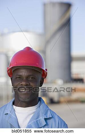 African American male construction worker wearing hardhat View Large Photo Image Stock Photography - African American male construction worker wearing hardhat. Fotosearch