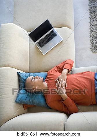 African American man sleeping on sofa View Large Photo Image Stock Image - African American man sleeping on sofa. Fotosearch