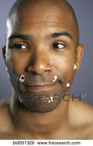 African American man with shaving cuts View Large Photo Image Stock Photograph - African American man with shaving cuts. Fotosearch