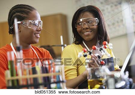 Stock Photography - African American teenagers in science class. Fotosearch