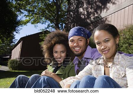 African friends hugging outdoors View Large Photo Image Stock Photo - African friends hugging outdoors. Fotosearch