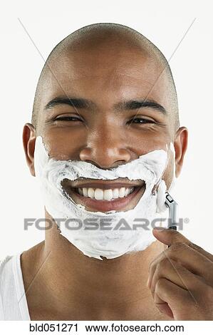 African man shaving face View Large Photo Image Stock Image - African man shaving face. Fotosearch