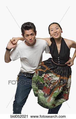Stock Image - Asian couple dancing. Fotosearch