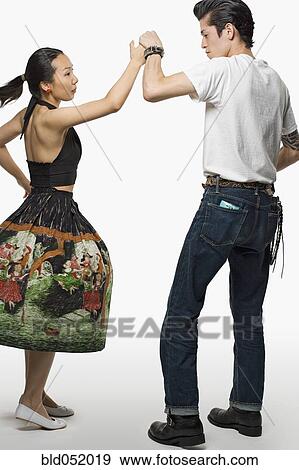 Asian couple dancing View Large Photo Image Stock Photo - Asian couple dancing. Fotosearch