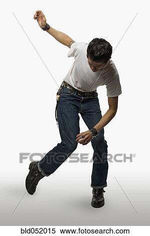 Stock Photography - Asian man in rockabilly clothing dancing. Fotosearch