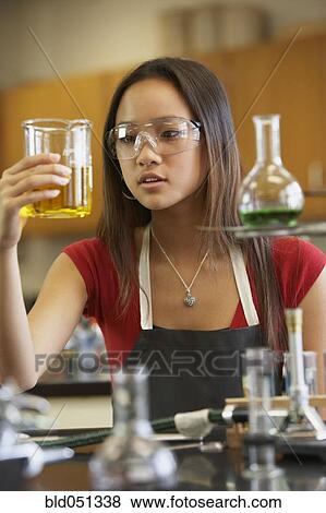 Asian teenaged girl in science class View Large Photo Image Stock Photo - Asian teenaged girl in science class. Fotosearch