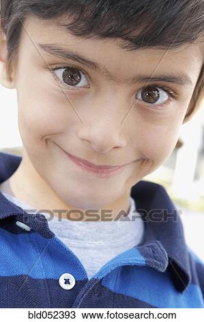 Close up of Hispanic boy smiling View Large Photo Image Stock Image - Close up of Hispanic boy smiling. Fotosearch