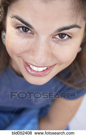 Close up of Hispanic woman smiling View Large Photo Image Stock Photo - Close up of Hispanic woman smiling. Fotosearch