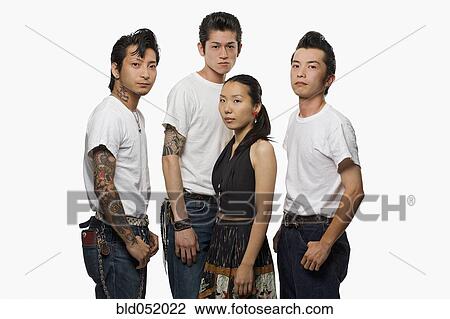 Group of Asian friends in rockabilly clothing View Large Photo Image Stock Image - Group of Asian friends in rockabilly clothing. Fotosearch