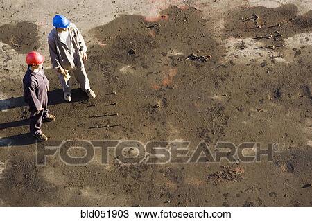 High angle view of multi-ethnic construction workers View Large Photo Image Stock Image - High angle view of multi-ethnic construction workers. Fotosearch