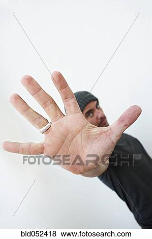 Hispanic man making stop gesture View Large Photo Image Stock Photo - Hispanic man making stop gesture. Fotosearch