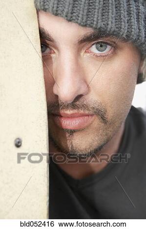 Stock Photograph - Hispanic man wearing wool hat. Fotosearch