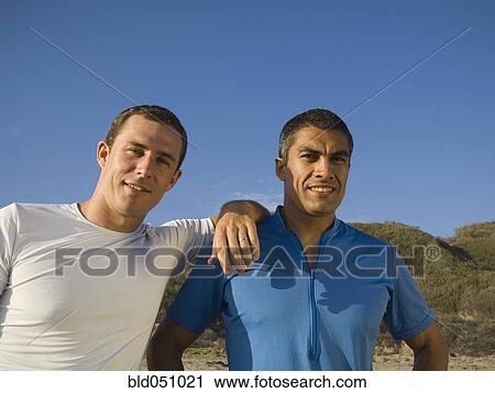 Hispanic men at beach View Large Photo Image Stock Image - Hispanic men at beach. Fotosearch