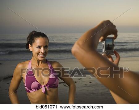 Hispanic woman having photograph taken View Large Photo Image Stock Image - Hispanic woman having photograph taken. Fotosearch