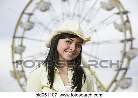 Mixed Race teenaged girl at carnival View Large Photo Image Stock Photo - Mixed Race teenaged girl at carnival. Fotosearch