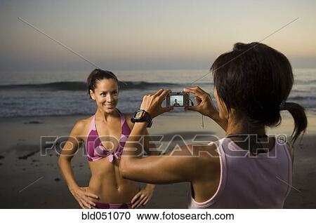 Multi-ethnic friends taking photograph View Large Photo Image Stock Image - Multi-ethnic friends taking photograph. Fotosearch