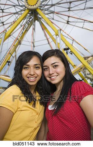 Multi-ethnic teenaged girls at carnival View Large Photo Image Stock Image - Multi-ethnic teenaged girls at carnival. Fotosearch