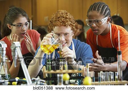 Multi-ethnic teenaged students in science class View Large Photo Image Stock Photo - Multi-ethnic teenaged students in science class. Fotosearch