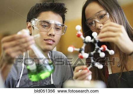 Multi-ethnic teenagers in science class View Large Photo Image Stock Photograph - Multi-ethnic teenagers in science class. Fotosearch
