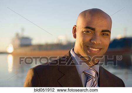 Stock Image - Portrait of African American businessman. Fotosearch