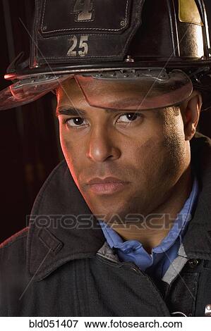 Portrait of Hispanic male firefighter View Large Photo Image Stock Photo - Portrait of Hispanic male firefighter. Fotosearch