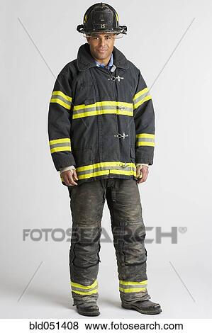 Portrait of Hispanic male firefighter View Large Photo Image Stock Photo - Portrait of Hispanic male firefighter. Fotosearch