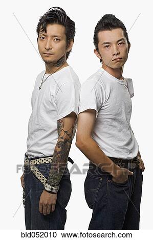 Two Asian men in rockabilly clothing View Large Photo Image Stock Image - Two Asian men in rockabilly clothing. Fotosearch