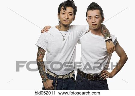 Two Asian men in rockabilly clothing View Large Photo Image Stock Image - Two Asian men in rockabilly clothing. Fotosearch