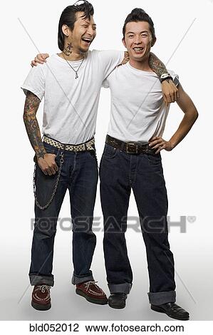 Two Asian men in rockabilly clothing View Large Photo Image Stock Image - Two Asian men in rockabilly clothing. Fotosearch