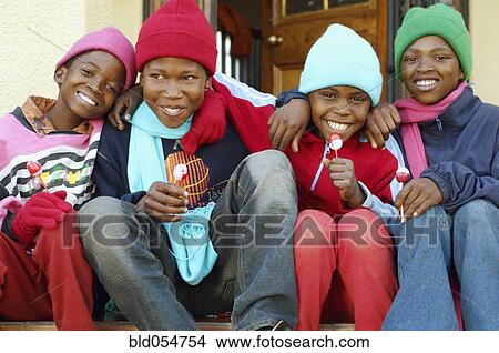 African children wearing winter hats View Large Photo Image Picture - African children wearing winter hats. Fotosearch