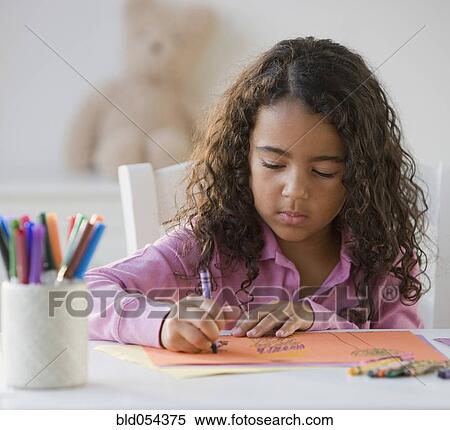 Stock Photography - African girl coloring. Fotosearch