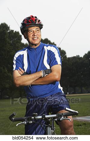 African man on bicycle View Large Photo Image Picture - African man on bicycle. Fotosearch